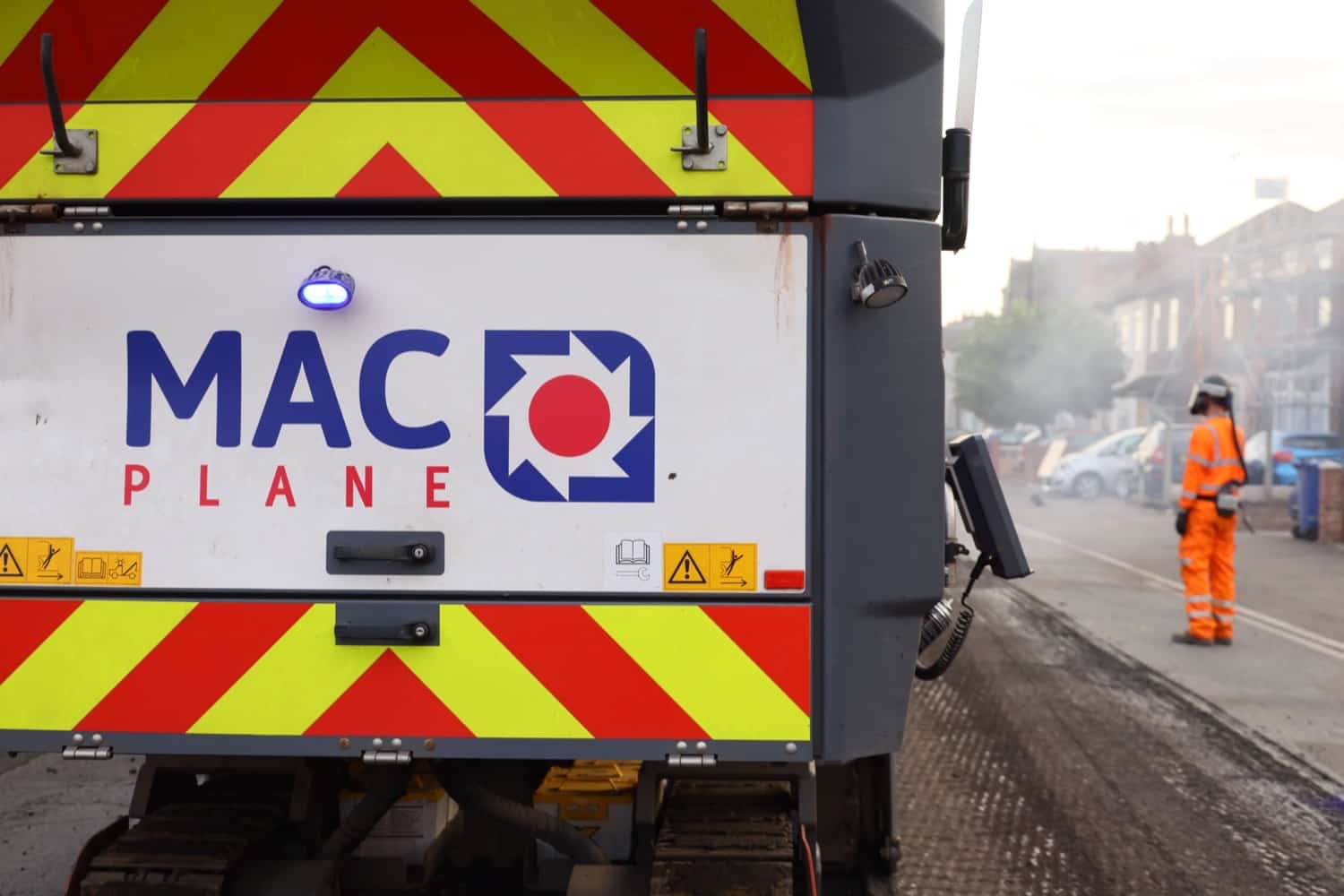 MAC road planer at dusk on a live carriageway