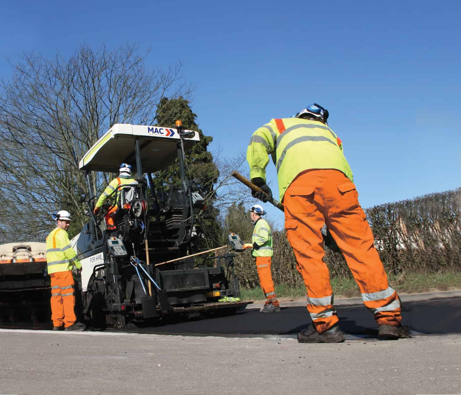 MAC Surfacing crew laying asphalt