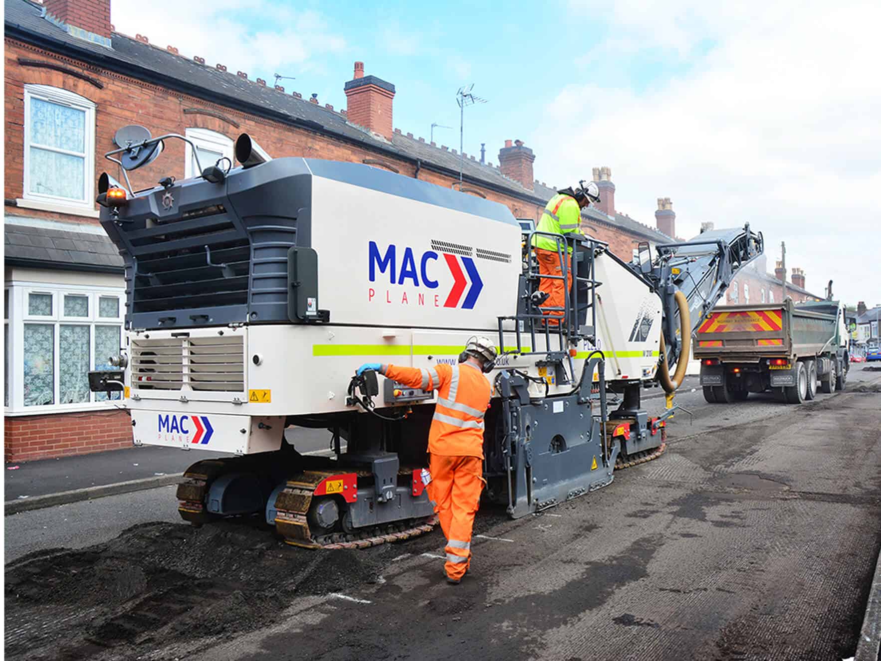 MAC Surfacing road planer planing a carriageway
